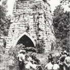 A group touring the blast furnace, 1940s