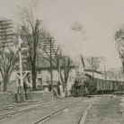 The N.Y. N.H. & H. Railroad pulling into a Willimantic station