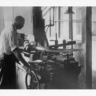 Cheney employee cutting elephant tusk