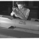 A toy factory is converted to manufacture parachute flares