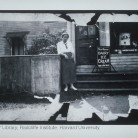 Anna James on the steps of James' pharmacy