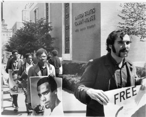 Protestors on May 1, 1969, in Hartford carried signs bearing a photograph of Huey P. Newton, a founder of the Black Panther party, and flags with the party emblem, a charging black panther. The Black Panther party was an often-militant group determined to bring justice to African Americans and was philosophically opposed to Dr. King's program of nonviolent resistance. Photograph by Ellery G. Kington - The Hartford Times Collection, Hartford History Center, Hartford Public Library