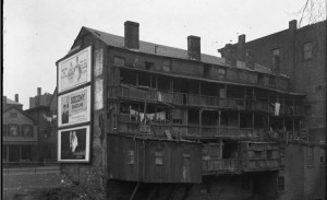 Detail from a glass plate negative showing the rear of one of the tenements that lined the Park River