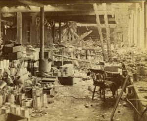 Ruins of a Portion of the Meriden Britannia Works. Photograph by Prescott & White, 1870. This view of one of the damaged floors shows a workbench still in place - Connecticut Historical Society
