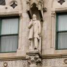 The Gideon Welles statue on the Connecticut State Capitol building's facade. 