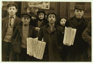 Hartford, Conn., newsboys. Boy in middle, Joseph De Lucco, has been selling for eight years. Was arrested for stealing papers a while ago. Photograph by Lewis Hine, March 1909 - Library of Congress, Prints and Photographs Division