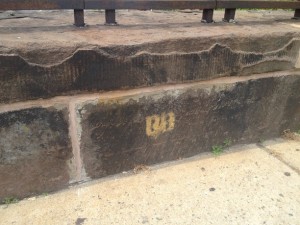 The remains of an official “BB” mark painted on a Hartford curb - Photograph by Steve Thornton