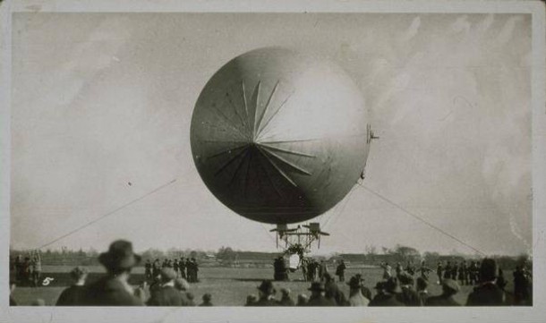 United States Army dirigible with crowd of onlookers