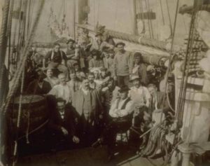 Captain James W. Buddington and crew on whaling schooner