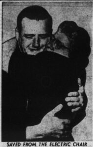 Newspaper clipping of a man hugging a woman with the caption "Saved from the Electric Chair"