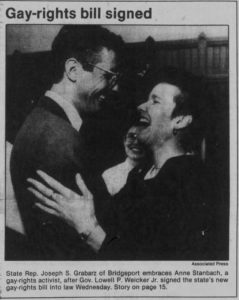 Rep. Joseph Grabarz embraces Anne Stanbach, a gay-rights activist, after gay-rights bill signed into law (May 1, 1991)