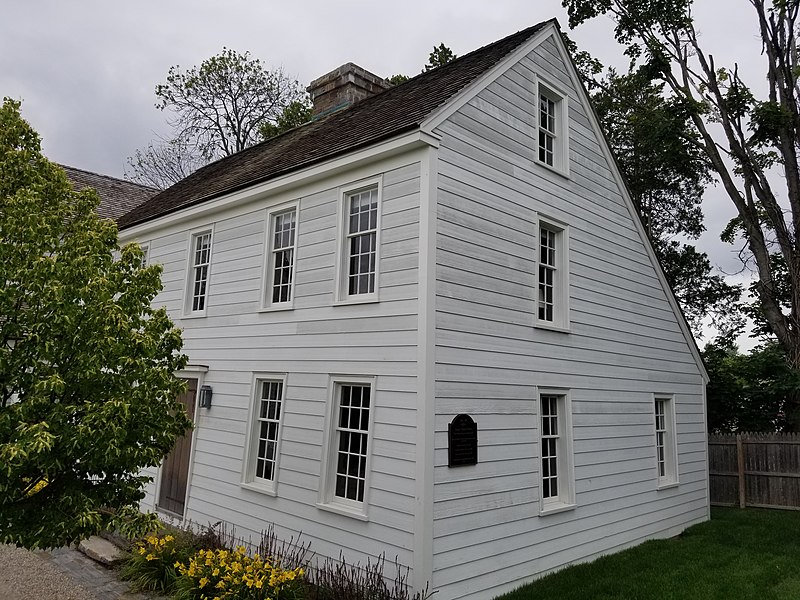 Side profile of a white wood house