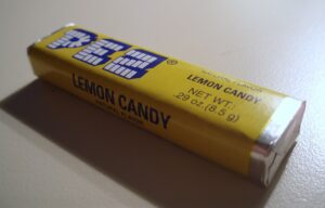 Image of a yellow wrapped PEZ lemon candy.