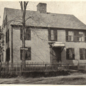 Black and white photograph of colonial home