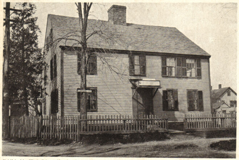 Black and white photograph of colonial home