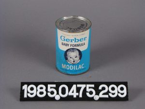 Can with a white and blue wrapper. There is a label in front with white numbers