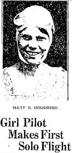 Newspaper clipping with a grainy image of a woman's profile with the headline "Girl Pilot Makes First Solo Flight"