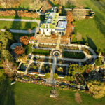 Aerial photograph of a house and gardens