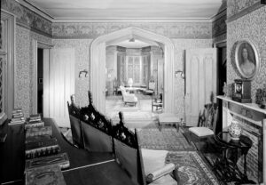 View of a room with sofas and a fireplace