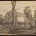 Black and white photo of a large home