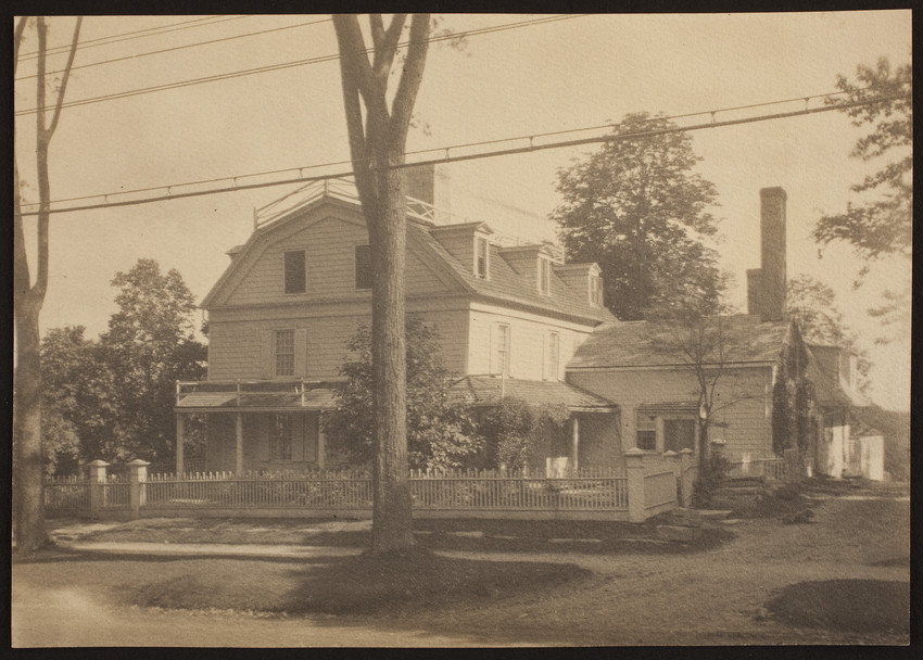 Black and white photo of a large home