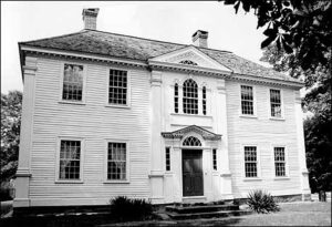 Black and white image of the front facade of a house