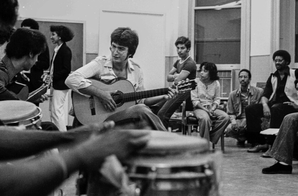 Rumba at 301 Crown. Constantino Argimon, 81, on guitar. Photo by David Gonzalez